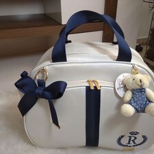 A Melhor Bolsa Bebê Resistente com Laço
